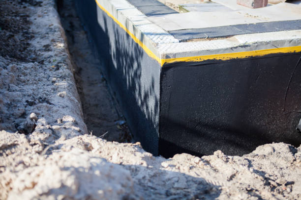 Professional Wet Basement Repair technician working in Massapequa Park, NY